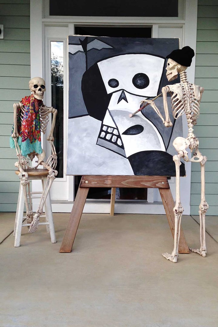 Funny Halloween skeletons posing.