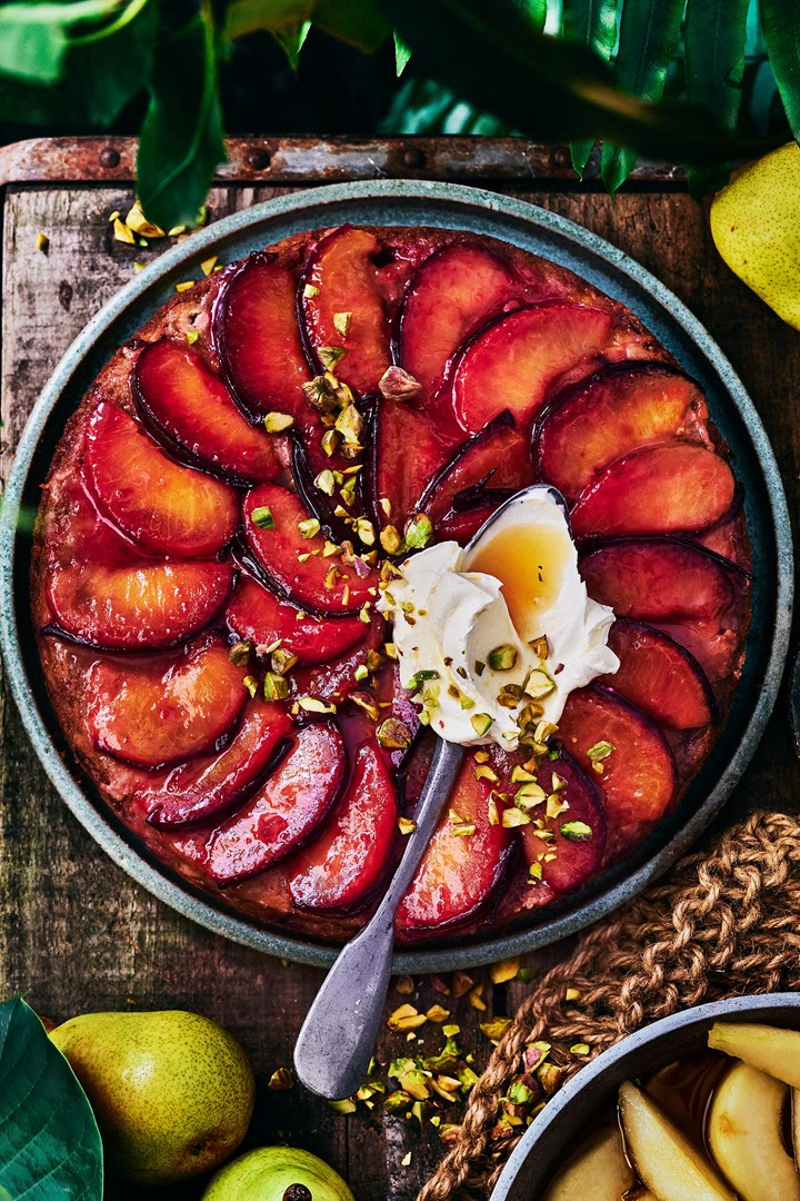 Upside-down plum cake with honeyed pears