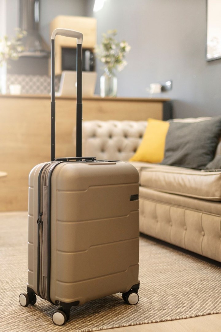 beige-suitcase-in-living-room