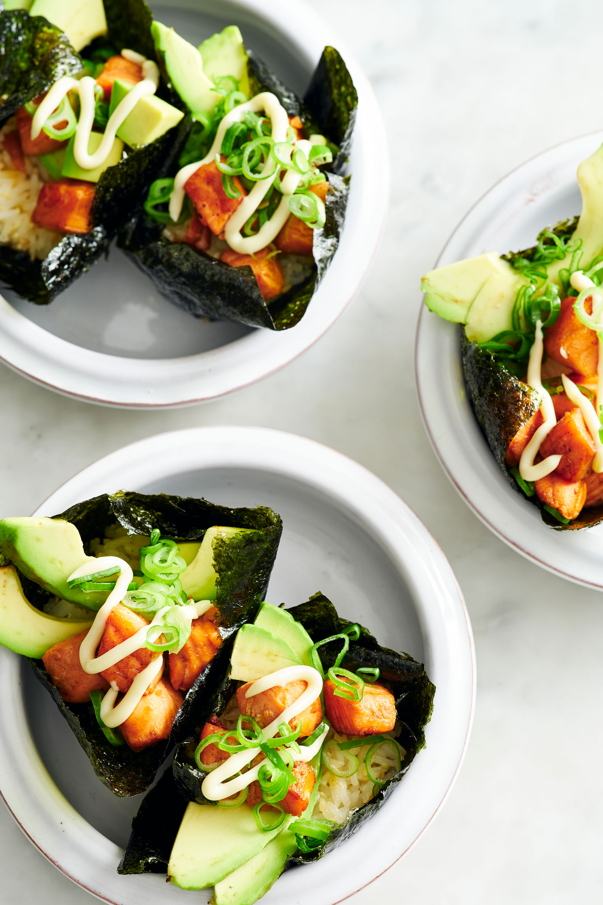 salmon sushi with avocado and mayo sauce