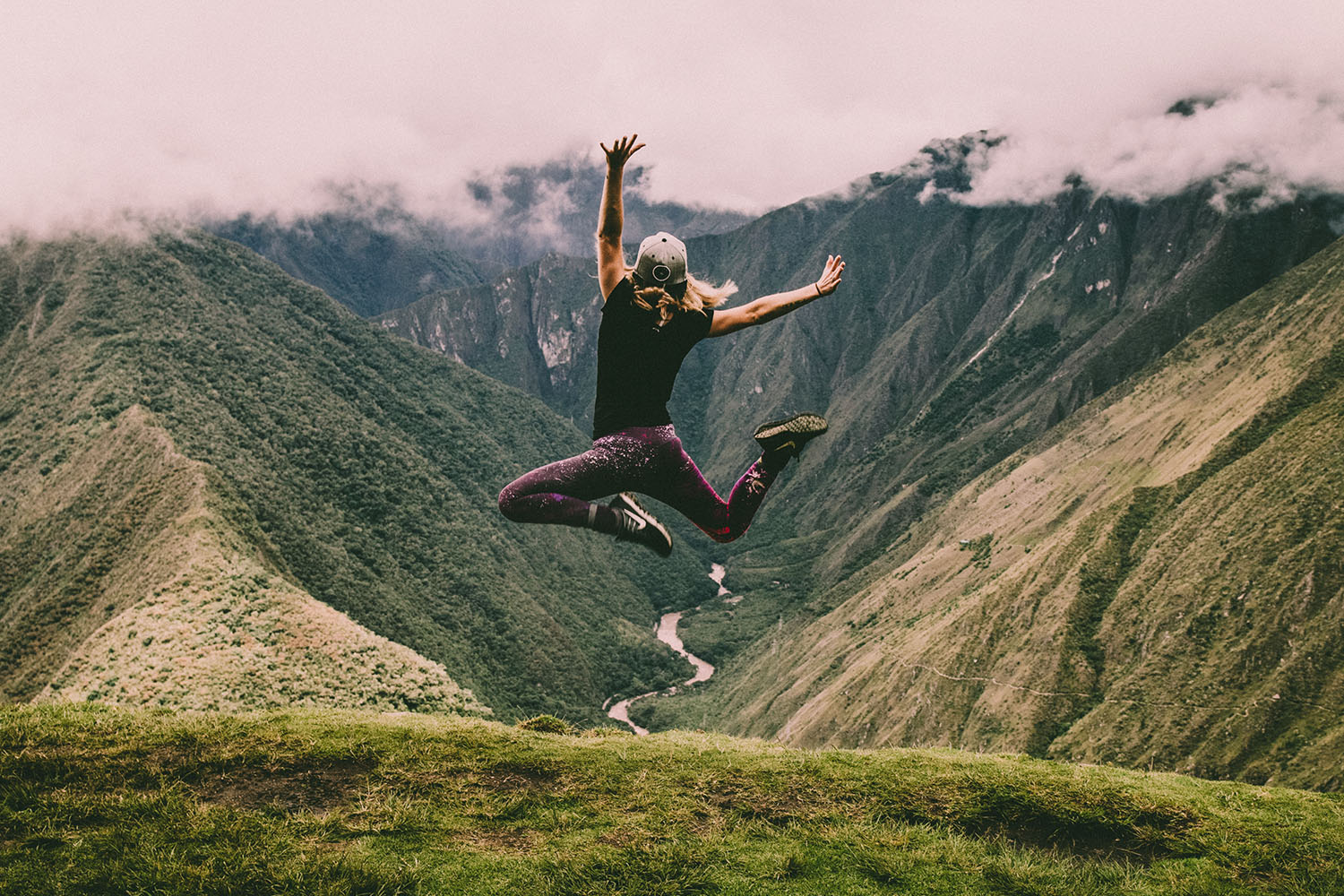 woman jumping in nature